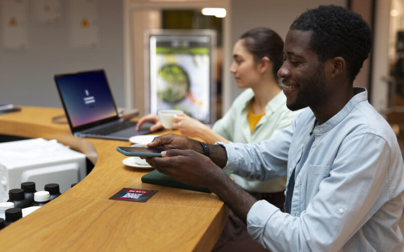 IT Jobs Pay 2025–2026. medium-shot-friends-medium-shot-friends-reading-menu-restaurant-scaled