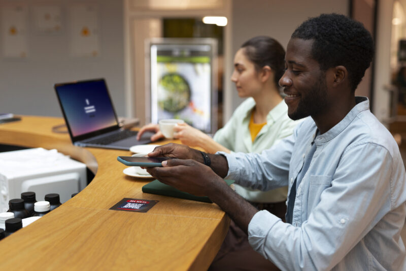 IT Jobs Pay 2025–2026. medium-shot-friends-medium-shot-friends-reading-menu-restaurant-scaled