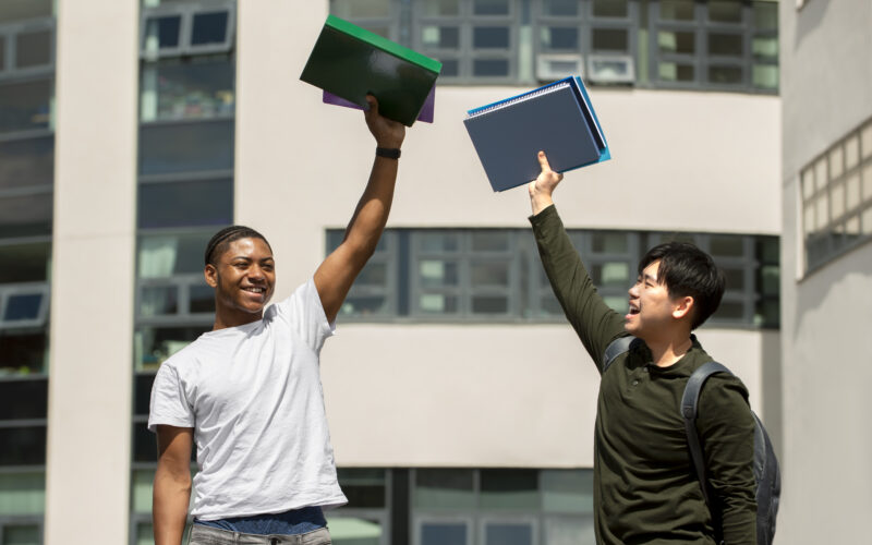 jobs with scholarships 2026. college-students-cramming-outdoor-1-scaled.jpg